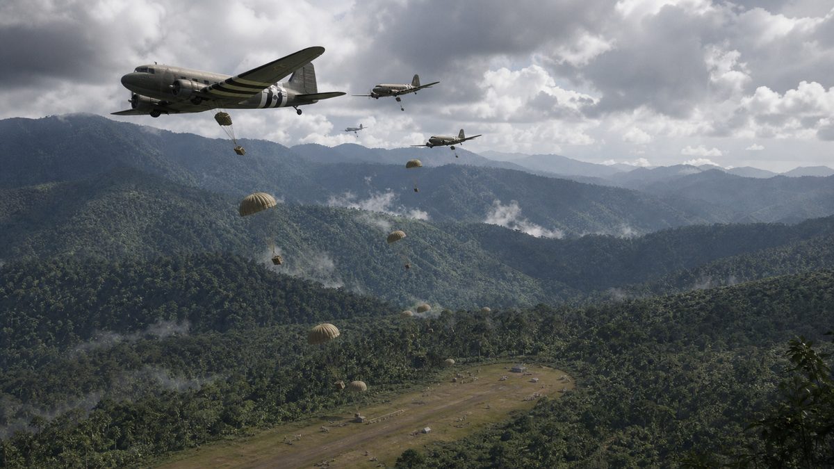 ニューギニア戦線で航空輸送によって物資を投下する輸送機のイメージ